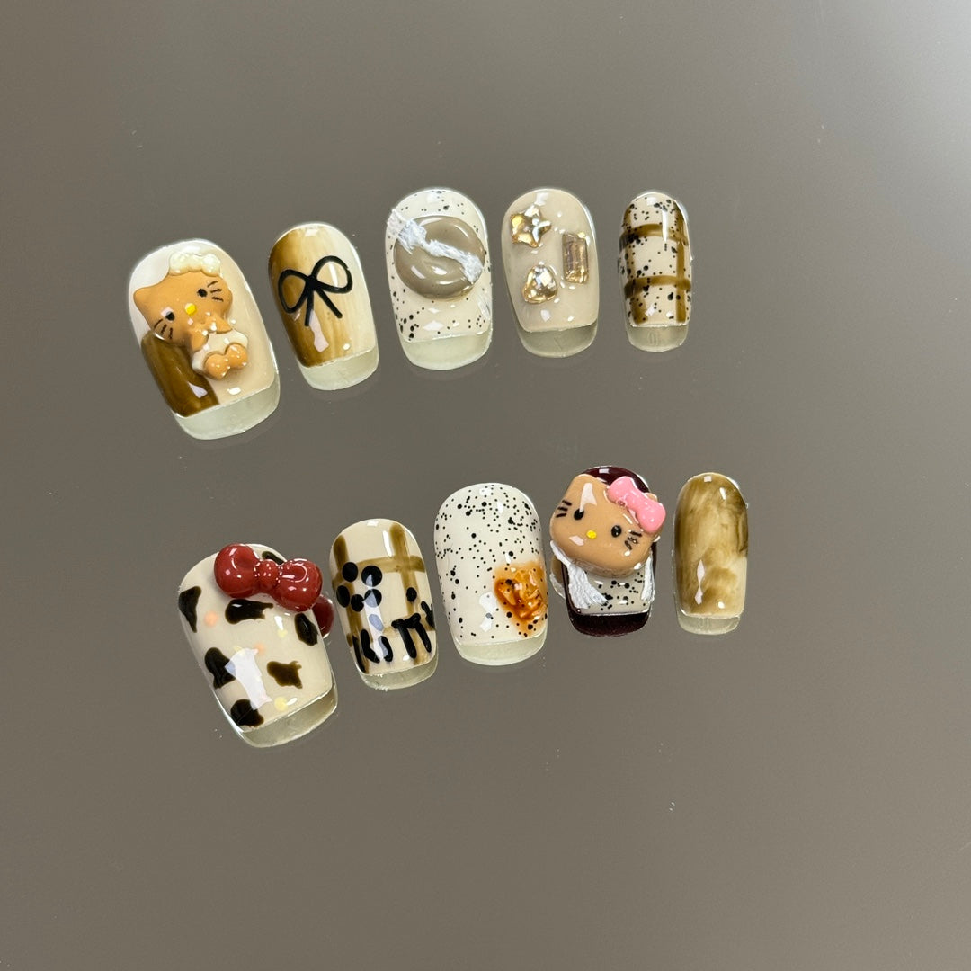 products of images_1: Hello Kitty Nail Charms: White Chrome Short Round Nails