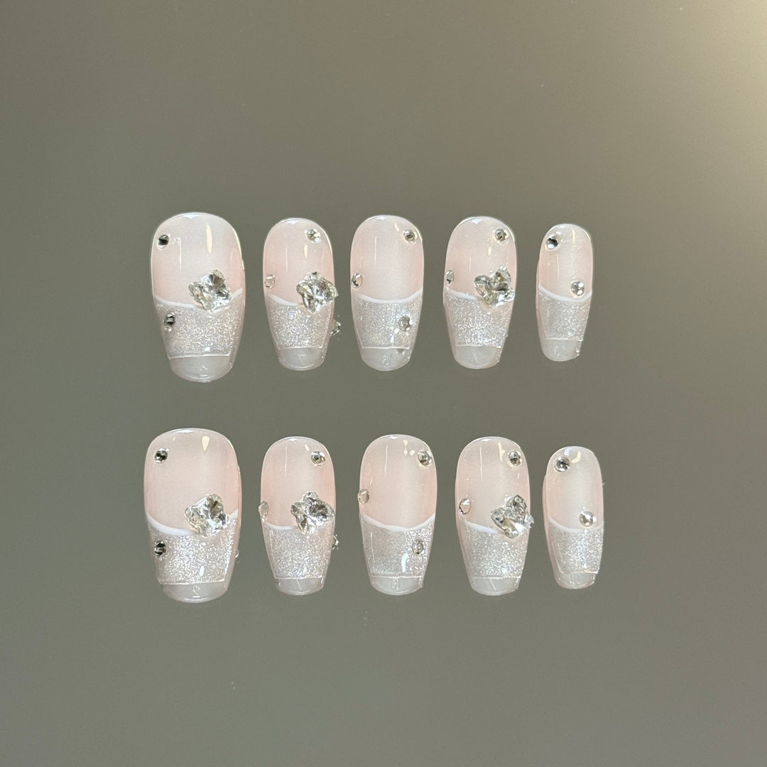 3. "Elegant White Pink Coffin Nails with a Chic Pink Cat Eye Accent for a Trendsetting Vibe"