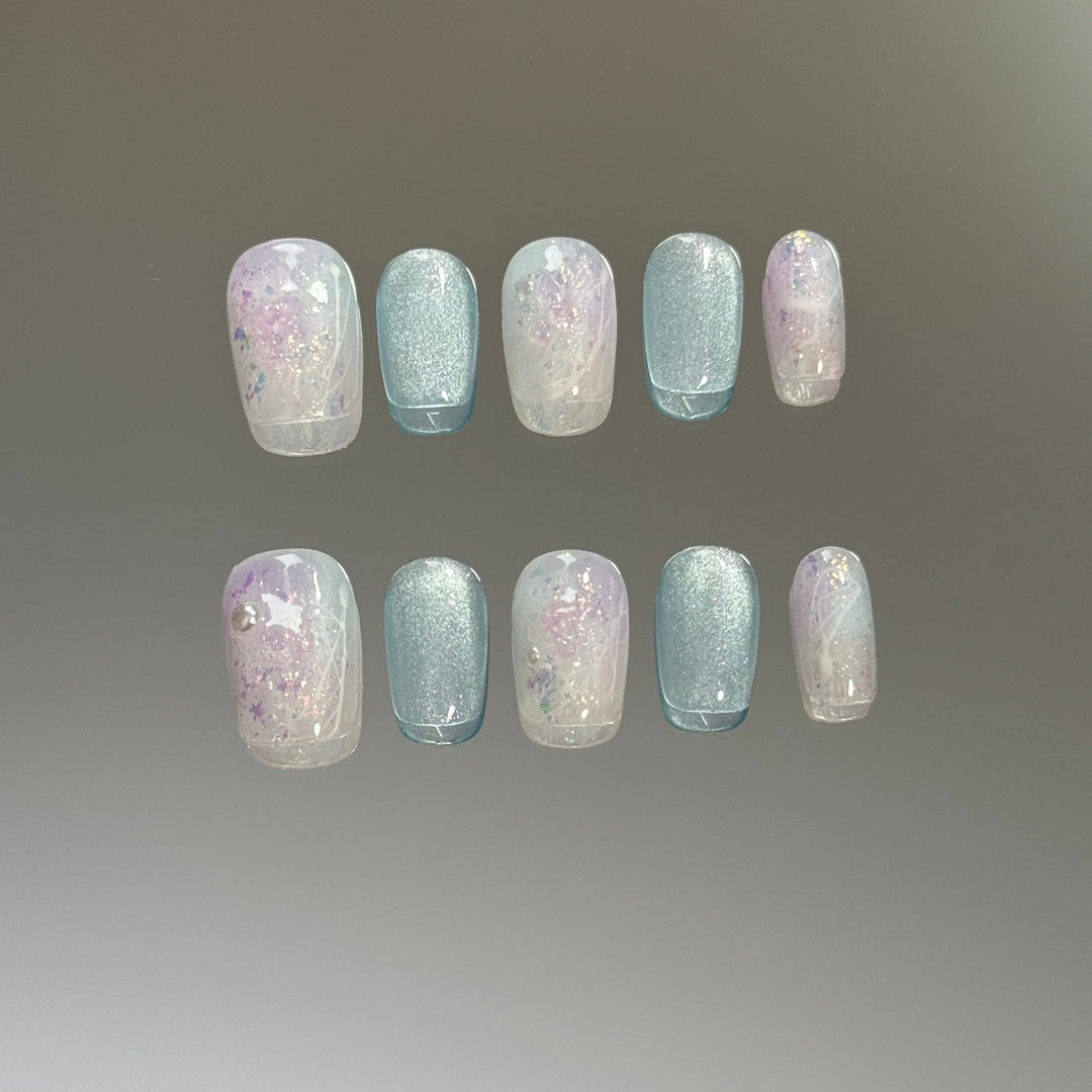 2. Glamorous Short Round PressOn Nails in Blue with Sparkling Acrylic Finish