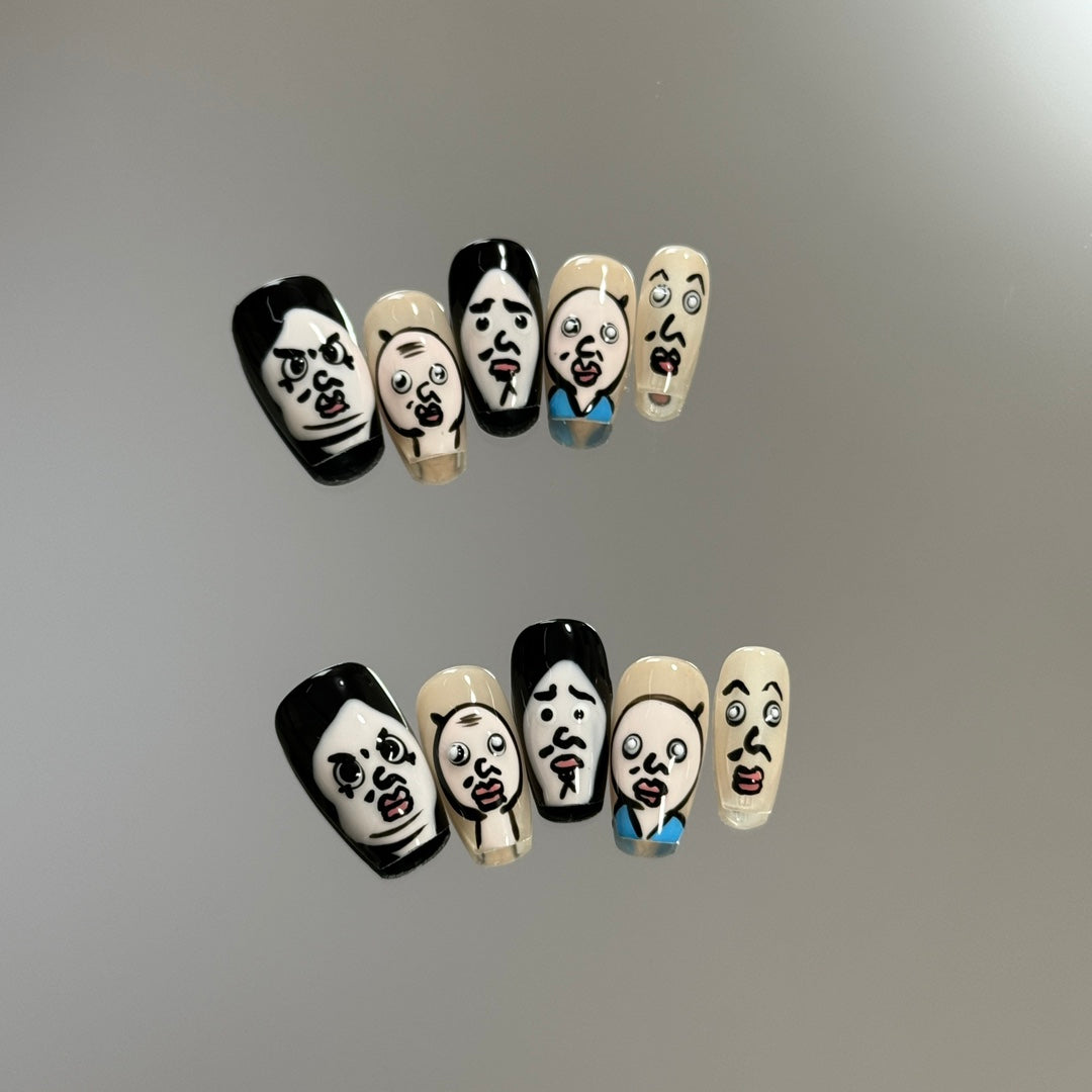 1. Stylish Black and White PressOn Nails with Medium C Coffin Shape and Cartoon Emo Designs