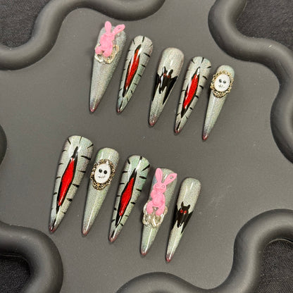 3. Chic Glitter Ombre PressOn Nails with Bat Pattern for Halloween Parties