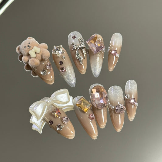 1. Adorable Teddy Bear Design on Brown Short Almond PressOn Nails for a Cute Nail Tech Look