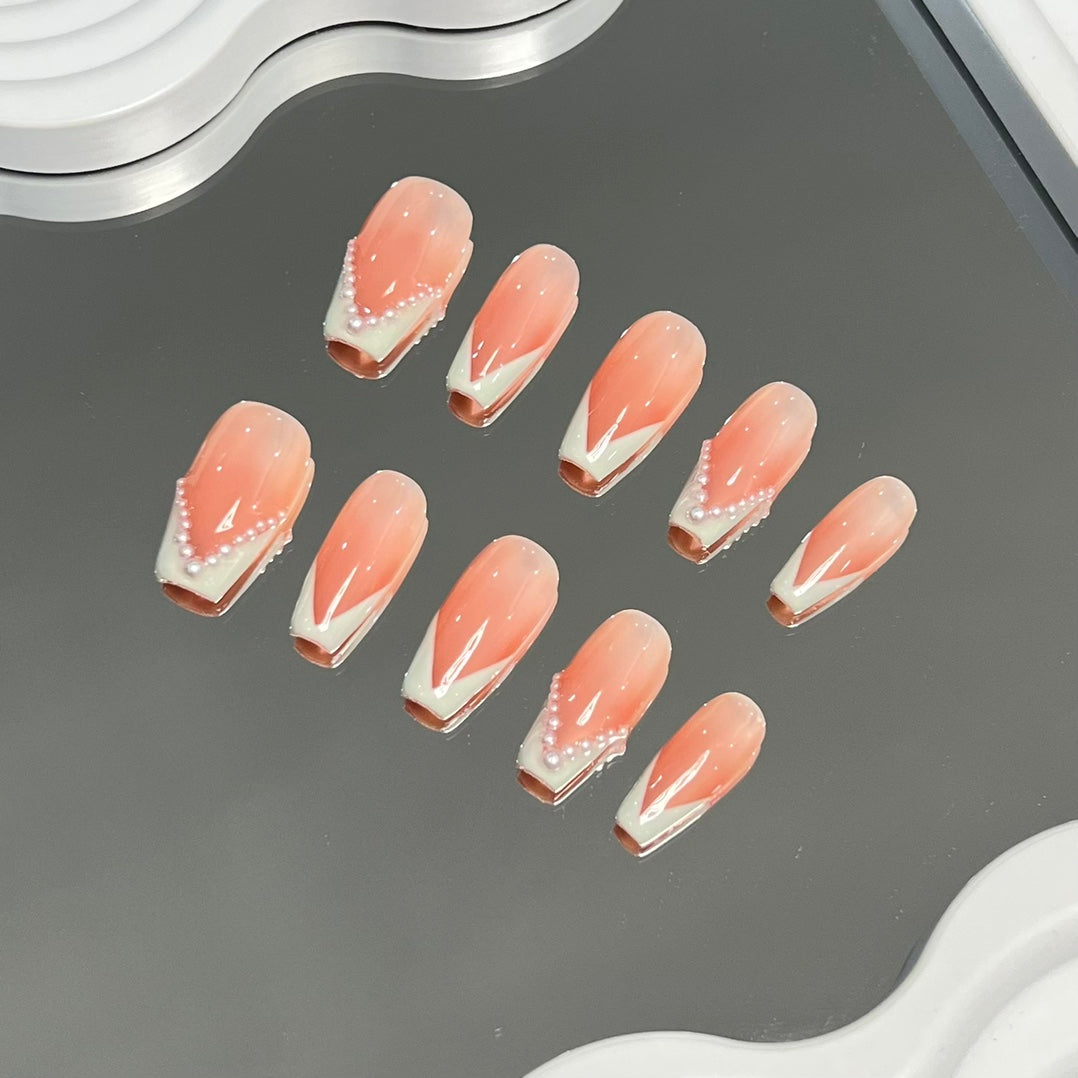 1. Glamorous Pink Ombre Coffin Nails for a Chic PressOn Manicure Experience