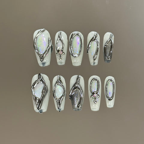 3. "Gorgeous White Chrome Medium Coffin Nails for a Chic and Trendy Appeal"