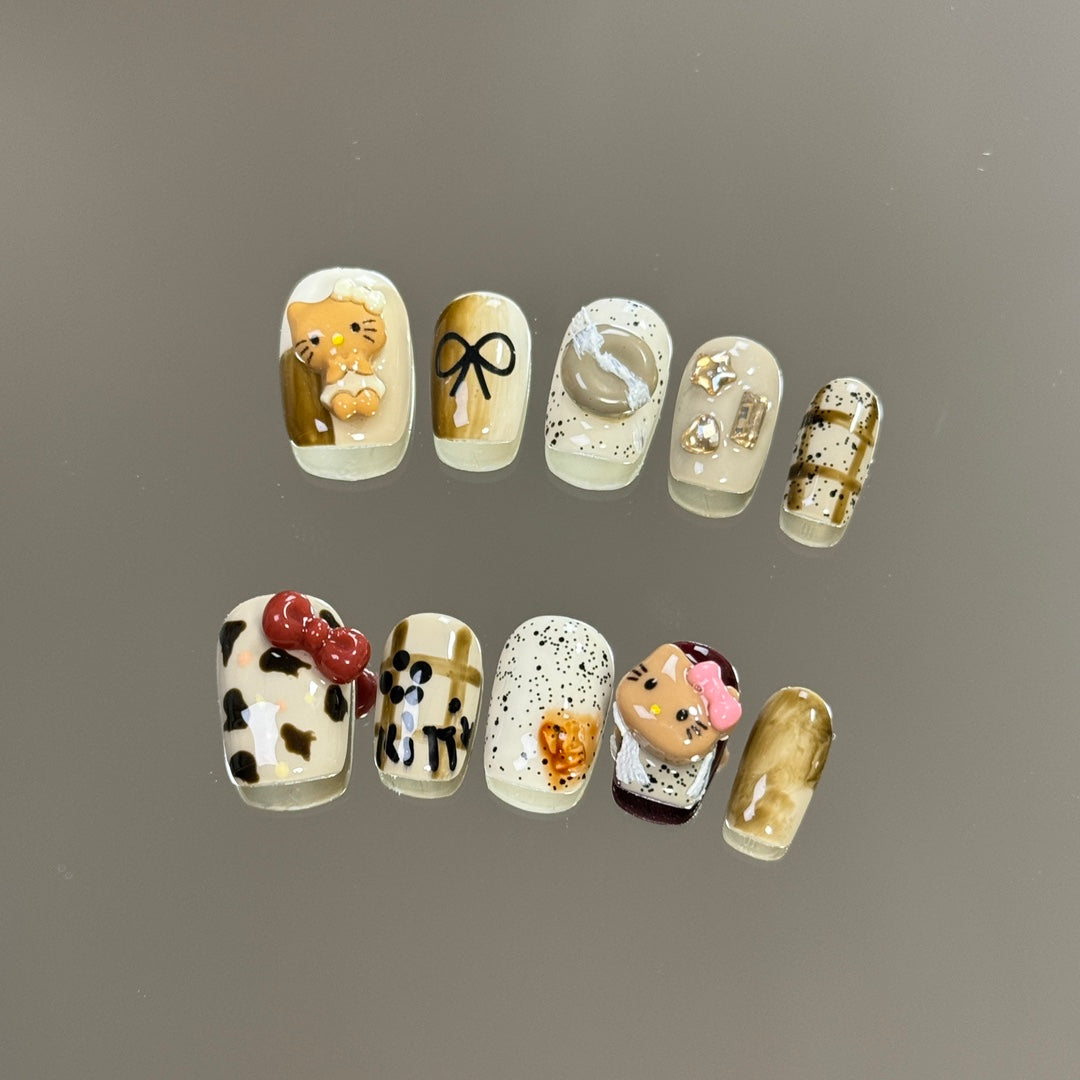 products of images_3: Hello Kitty Nail Charms: White Chrome Short Round Nails