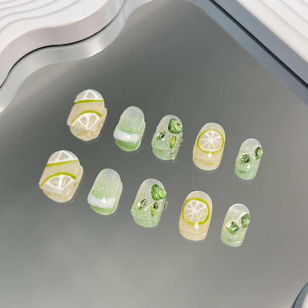 1. Lime green and lemon yellow 3D cherry design short round presson nails for summer.