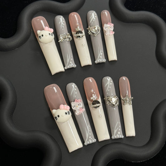 1. "Glamorous DuckShaped PressOn Nails in Brown and White Acrylic with Hello Kitty Design"