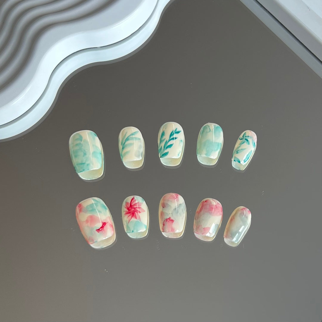 1. Short Coffin Shape PressOn Nails with Tropical Green Leaf Patterns for a Vibrant Look