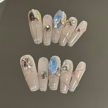 1. Glamorous Pink Chrome Long Coffin PressOn Nails with Luxurious Gemstone Nail Art Designs