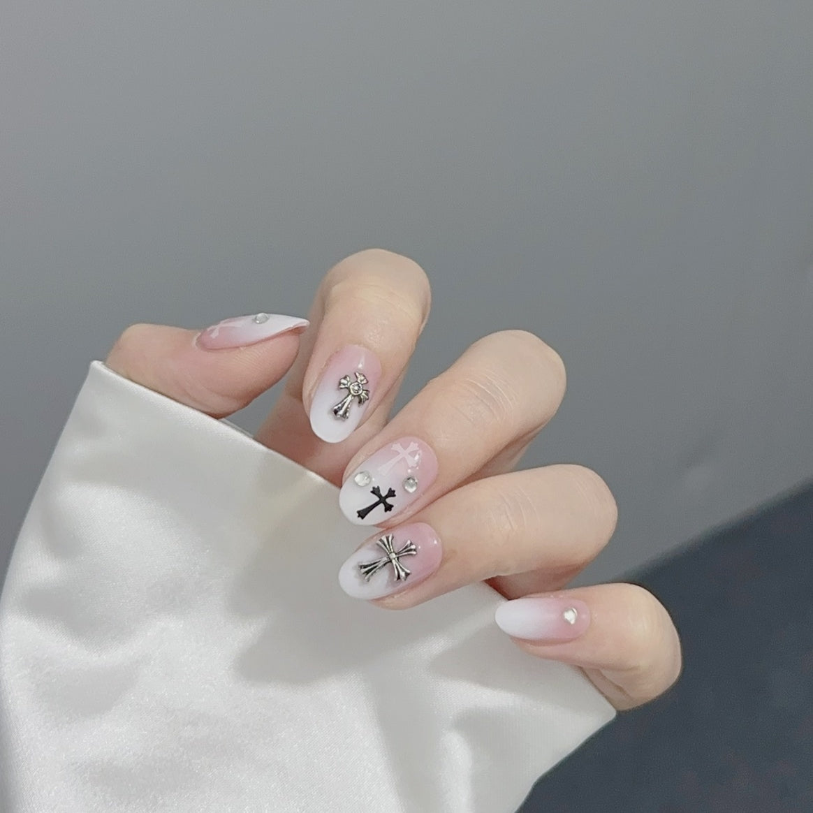 3. "Elegant PressOn Acrylic Nails in Ombre Pink and White with Chrome Heart Details"