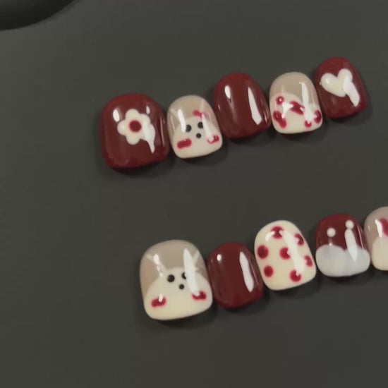 2. Glossy Finish Short Round RabbitThemed Nail Designs for Easy PressOn Application