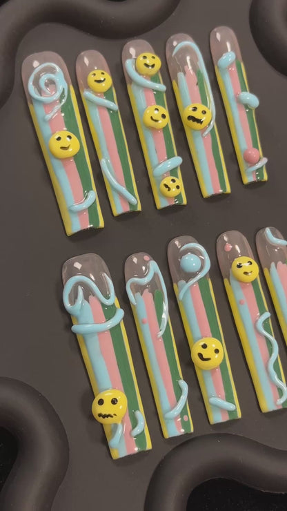 3. Express your style with these cute emoji presson nails featuring a long square nail shape for a unique touch.