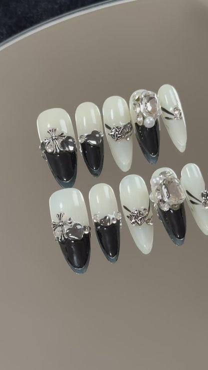 3. "Elegant Almond Shaped PressOn Nails with Black & White Diamond Design"