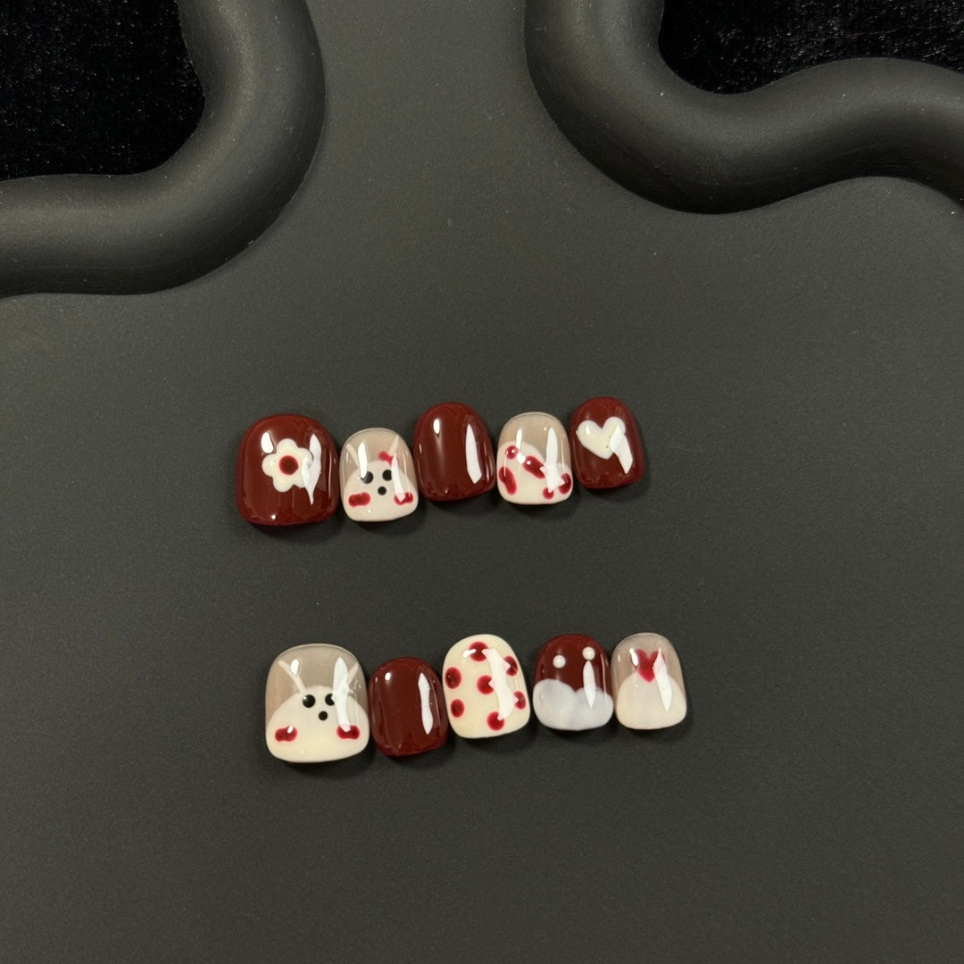 1. Stylish Red Aspen PressOn Nails with Cute Rabbit Nail Art for Short Round Fingernails