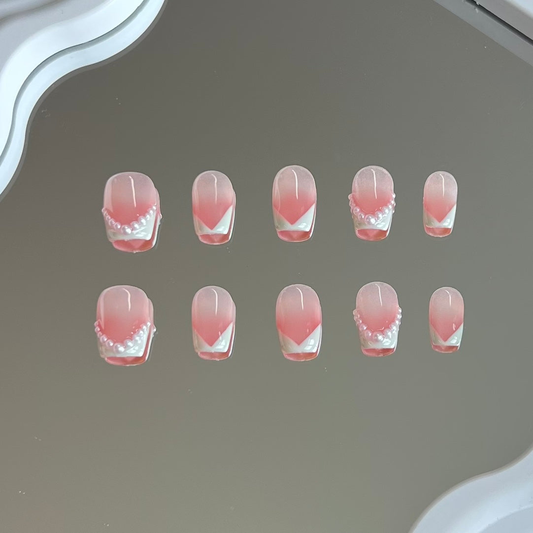 2. Stylish Short Coffin Shaped PressOn Nails with a Subtle Pink Ombre Design