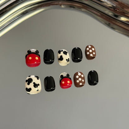 2. CartoonInspired Mickey Mouse PressOn Nails in Sleek Black Chrome