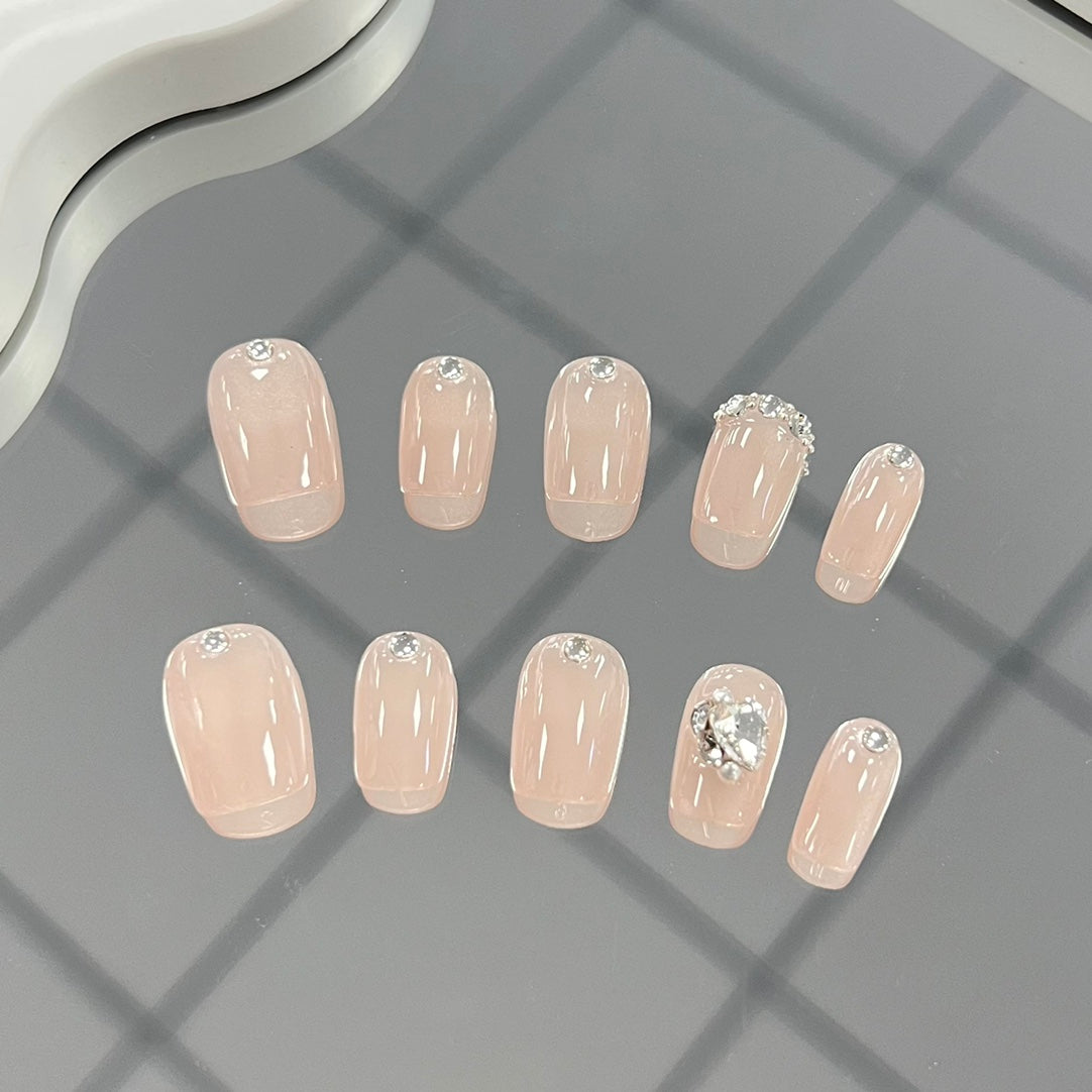 1. Stylish Squoval PressOn Nails with Nude Nail Art for Summer