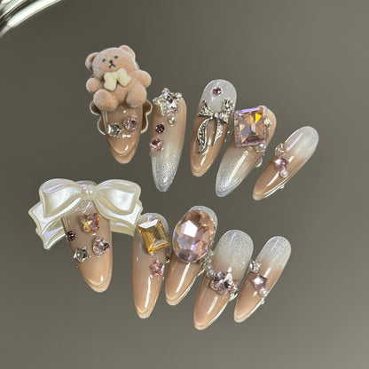 2. Cute and Trendy Teddy Bear Pattern on Brown Almond Shaped PressOn Nails for Nail Tech Enthusiasts