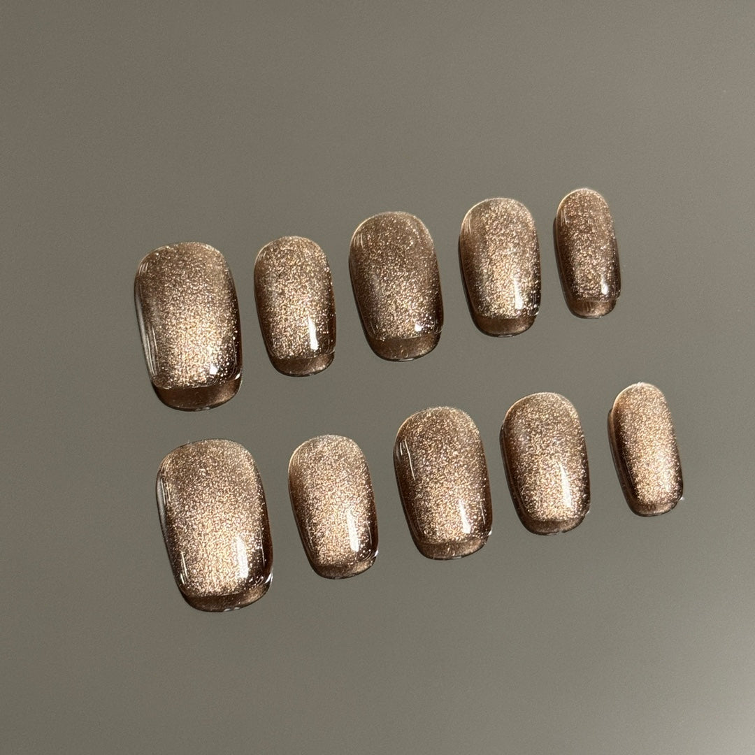 3. "Brown PressOn Nails with Sparkling Cat Eye Design"