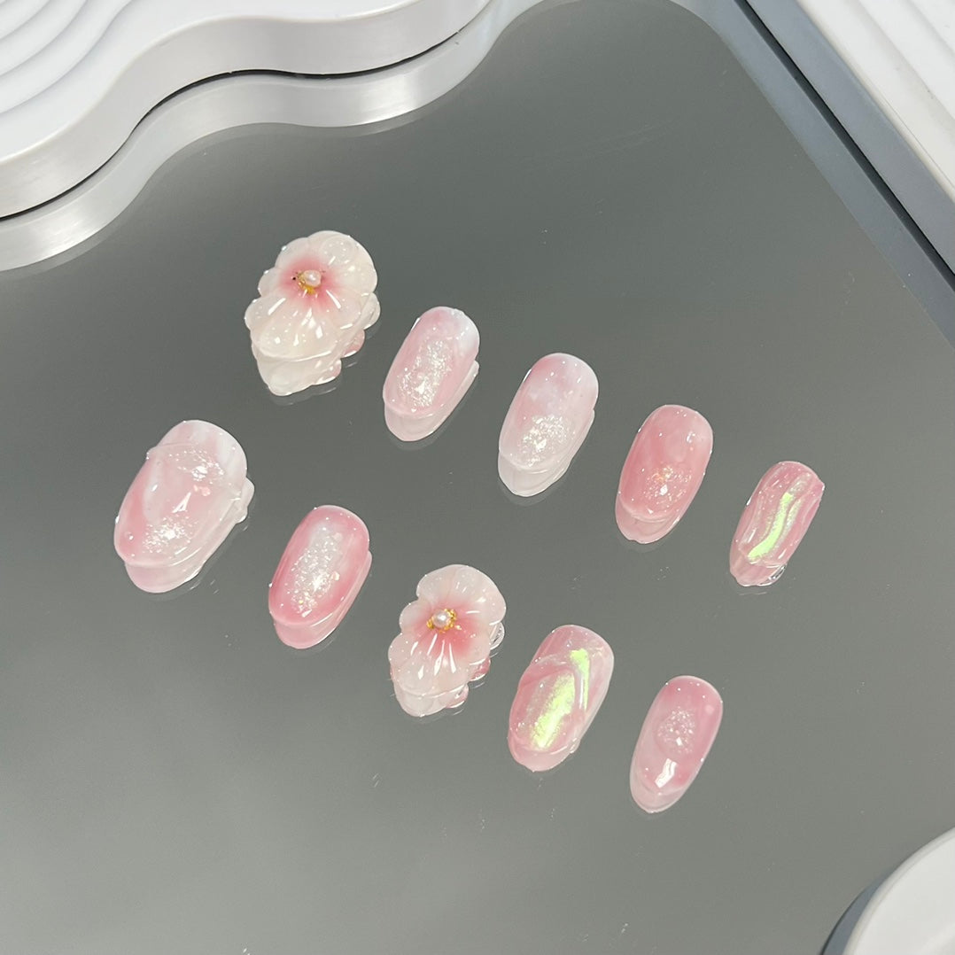 2. Cute and Trendy Short Round PressOn Nails in a Blossom Nail Salon Design